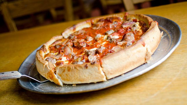 sausage deepdish pizza on pan