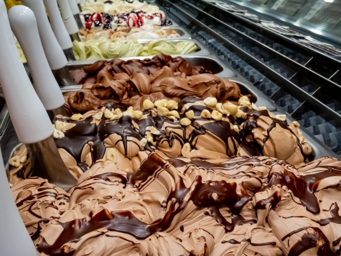 ice cream counter showing dozens of flavors to choose from