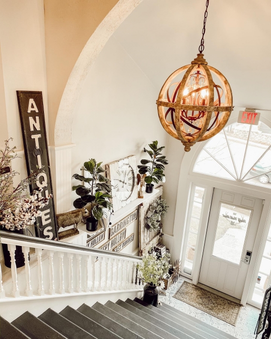 looking down a flight of stairs to gift shop entrance