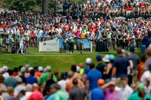 Golfer and crowds at the John Deere Classic.