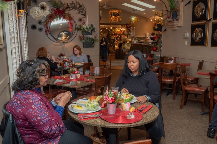 tea shoppe with two black ladies sitting at a table