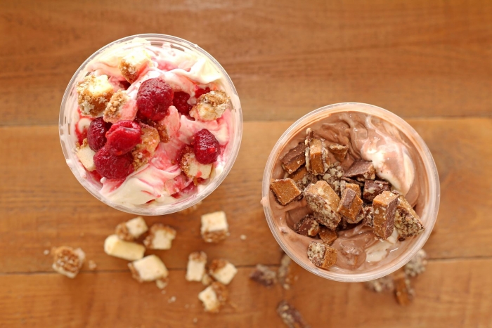 strawberry ice cream sundae and chocolate ice cream sundae top-view