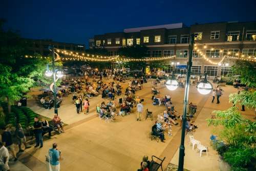 outdoor plaza with people summer night