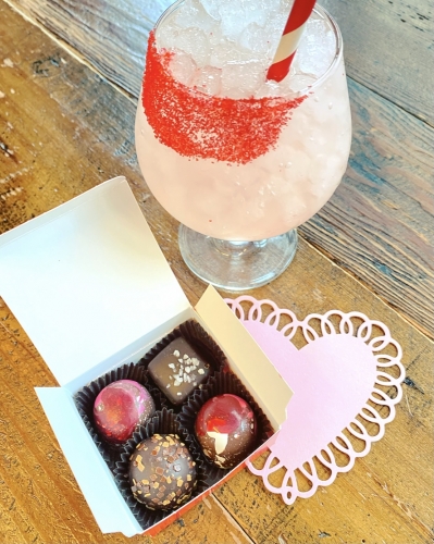 cocktail drink with box of chocolates
