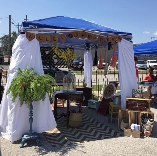 vendor tent at outdoor art fair