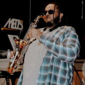 Image for Wine Down Wednesday with Saxaphone by Anthony Collins